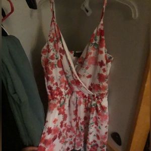 Super cute size Small Romper! It’s stretchy and does fit bigger, is adjustable!